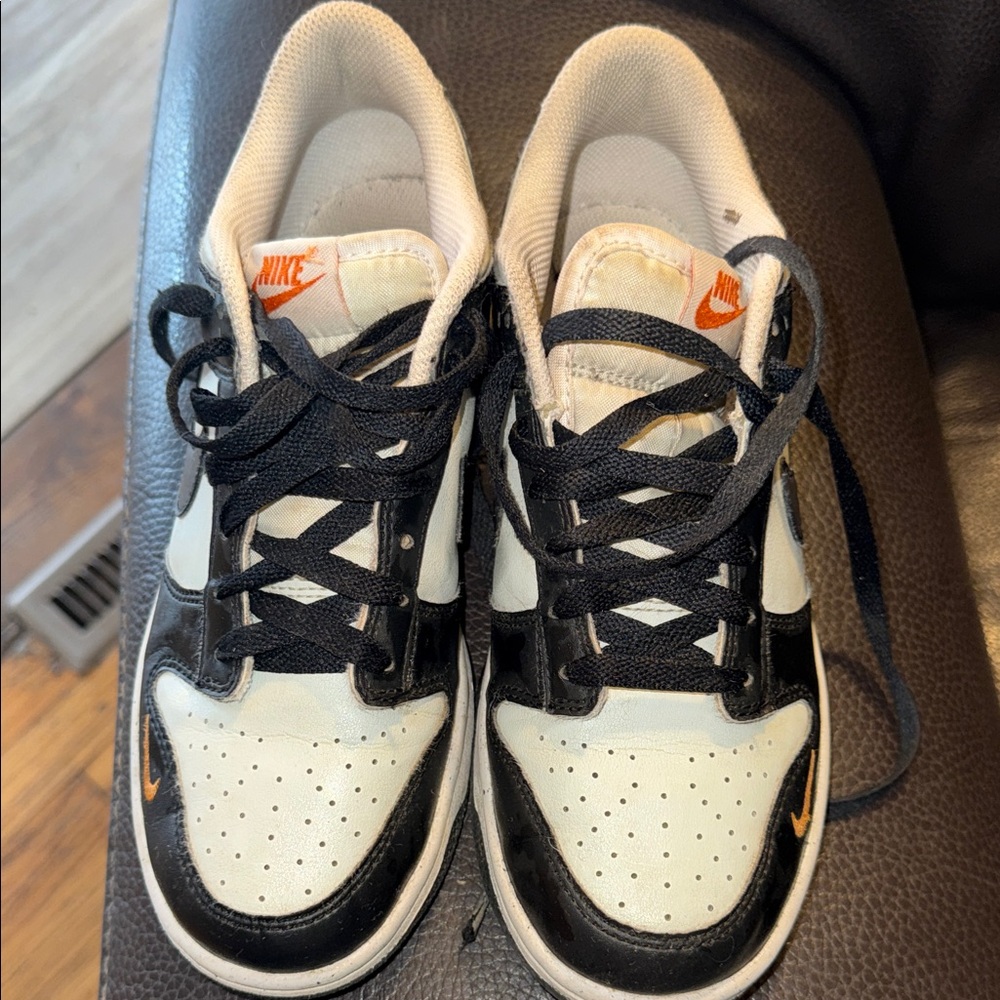 Nike Kids Black and off White Sneakers with Orange Accents